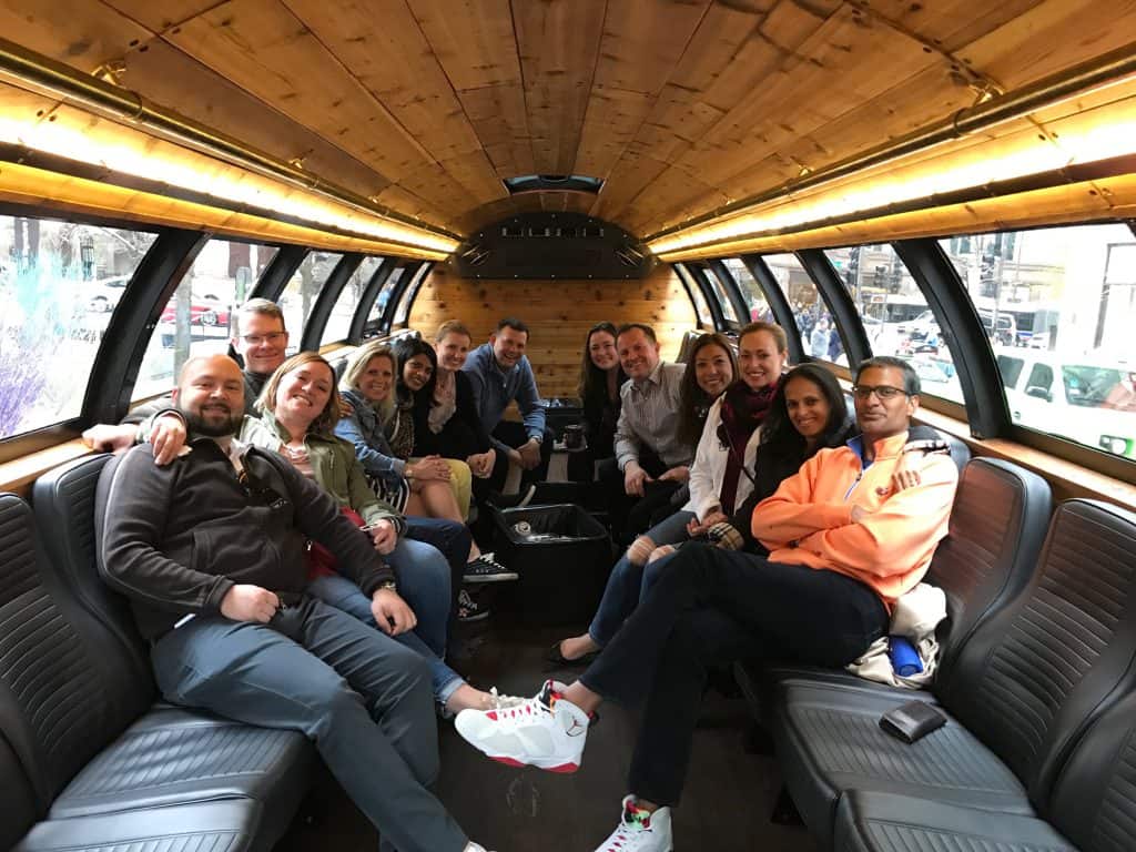people sitting inside the Chicago barrel bus on a private group tour